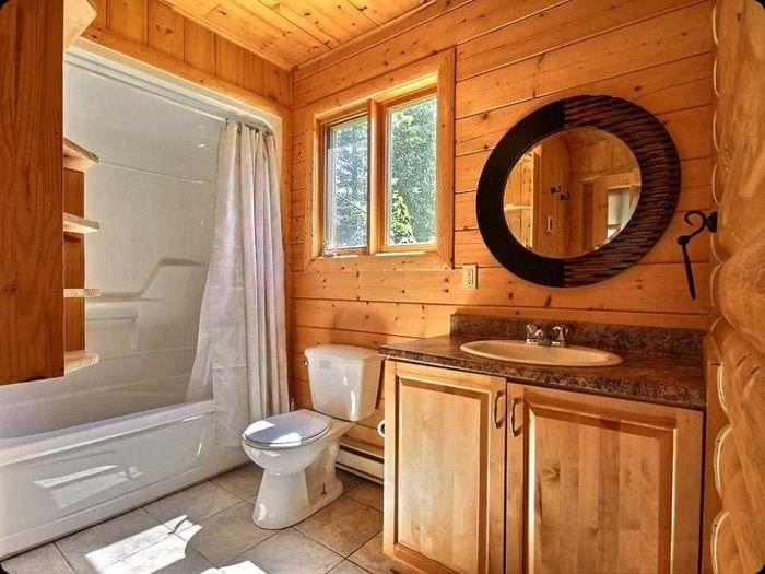 идея современного дизайна ванной комнаты в деревянном доме