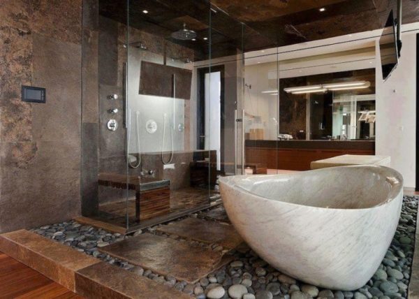 Делаем пол в ванной из гальки: технология приклеивания мозаики из камешков 24.07.2014 – Опубликовано в: В санузле – Метки: галька